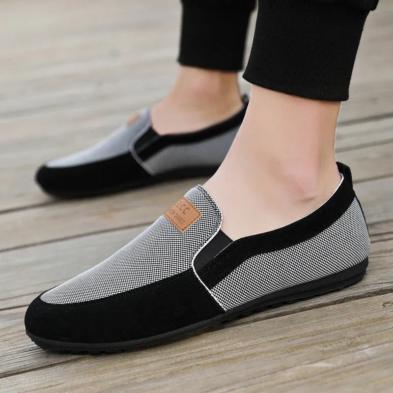 Men's grey and khaki canvas casual board shoes with round toe and rubber sole.