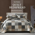 Pure cotton double-sided bedspread and pillowcase set in a geometric print, laid on a 1.8m bed.