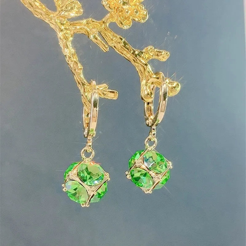 Geometric copper zircon earrings with rose design element in electroplated finish