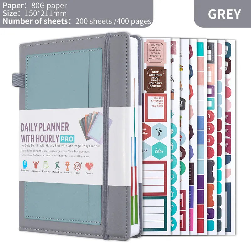 A5 no-date notebook with soft PU cover shown in purple, green, grey, black, pink, and orange, with planning stickers