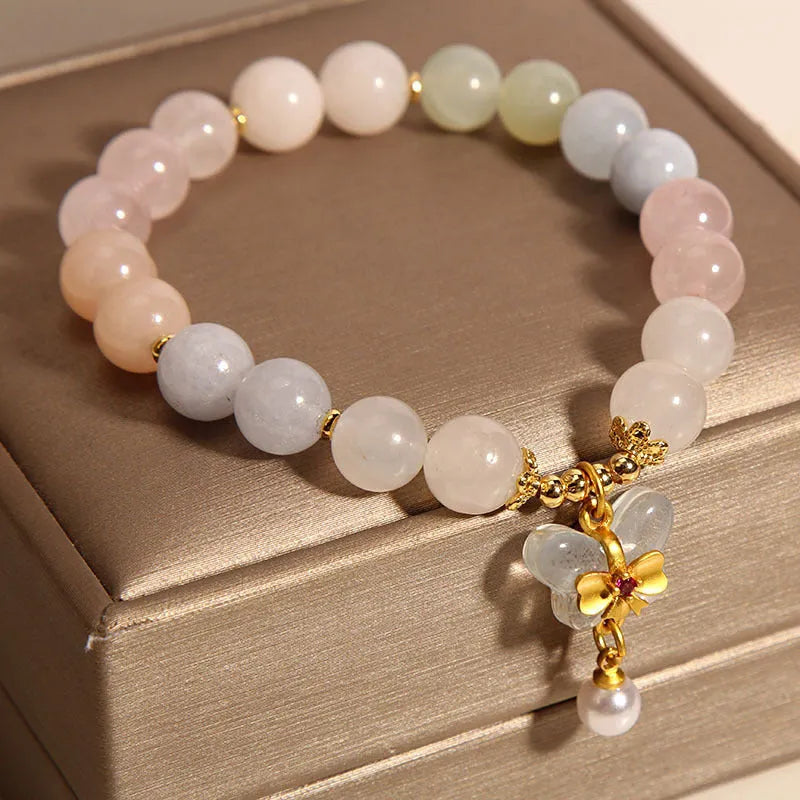 Women's bracelet with colourful Morganite butterfly pendant and crystal links.