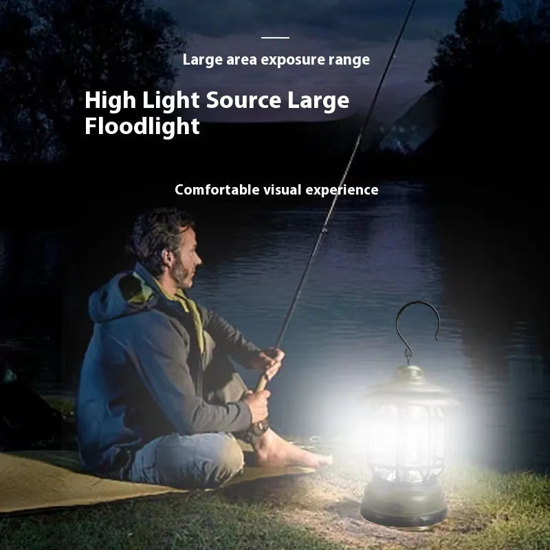 Portable camping lantern in black, red or dark green with dimensions 16.6cm x 6.7cm x 9.6cm