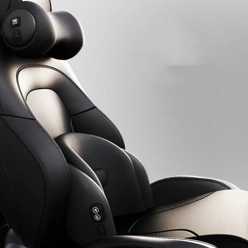 A black car massage cushion with electric vibration controls, placed on a car seat for neck and lumbar support.