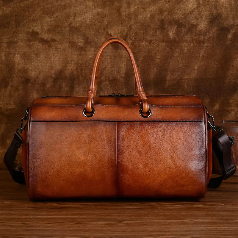 Brown genuine leather backpack with retro styling and 20L capacity