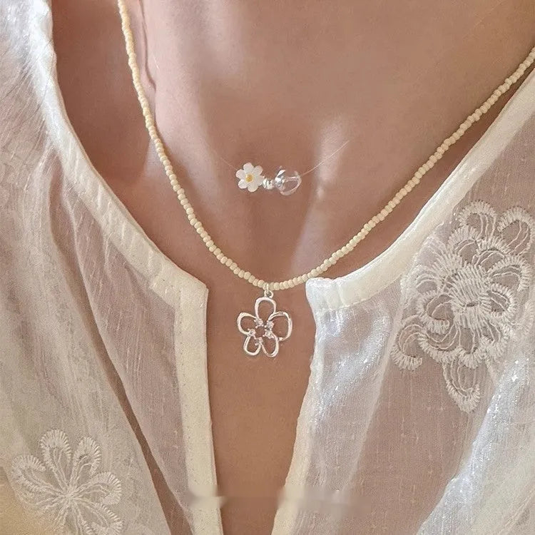 Women's electroplated copper hollow flower pendant necklace with colourful beaded accents and U-shaped design