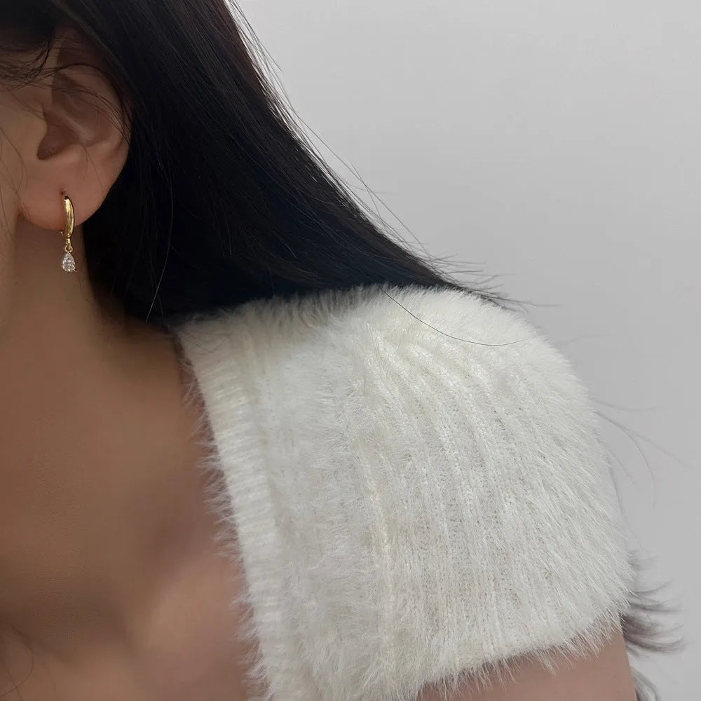 Geometric zircon necklace, earrings, and anklet set in a Korean-style meteor shower design.