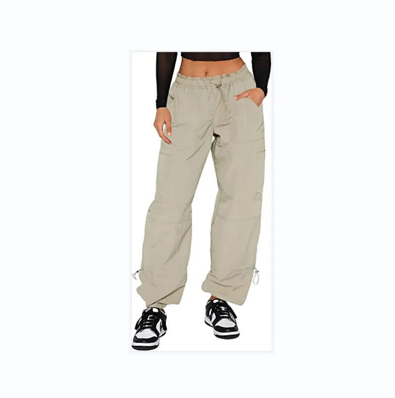 Man's loose-fit straight-leg cargo pants in polyester, shown in a choice of colours including khaki and grey.