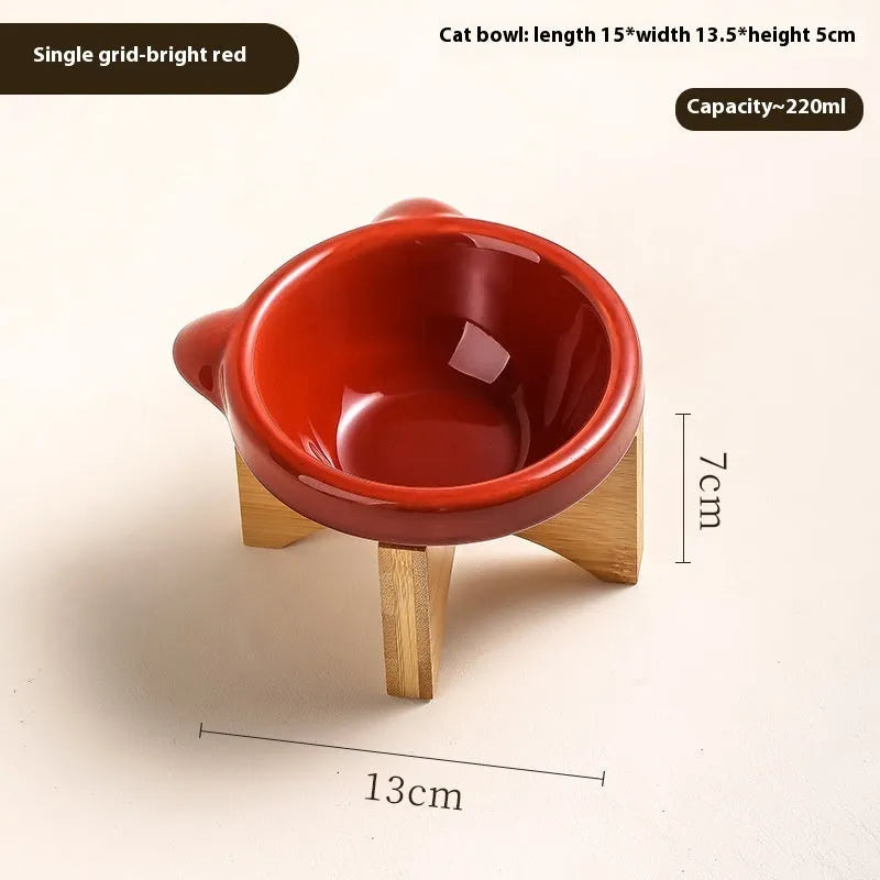 Porcelain cat drinking water bowl in bright red single grid configuration on surface