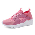 Women's lightweight mesh trainers with flat heel and shallow mouth, shown in white, black, army green, black and white, and pink