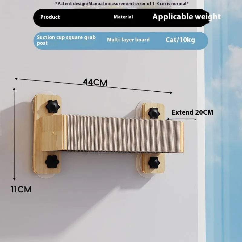 White space capsule cat scratching post with sisal rope, suspended from a ceiling with suction cups.
