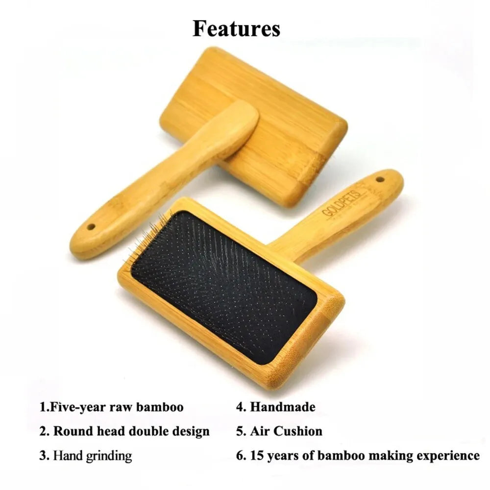 Goldpets bamboo slicker brush with wooden handle and 304 stainless steel pins on a light background