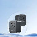 Black universal travel adapter UA12 with four-bit multi country converter, 70x64x48mm PC housing