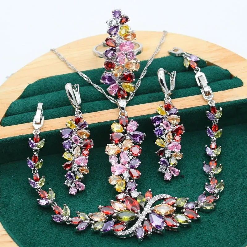 Retro jewellery set with plant pattern design showing necklace, bracelet, earrings, and ring in alloy and copper zircon