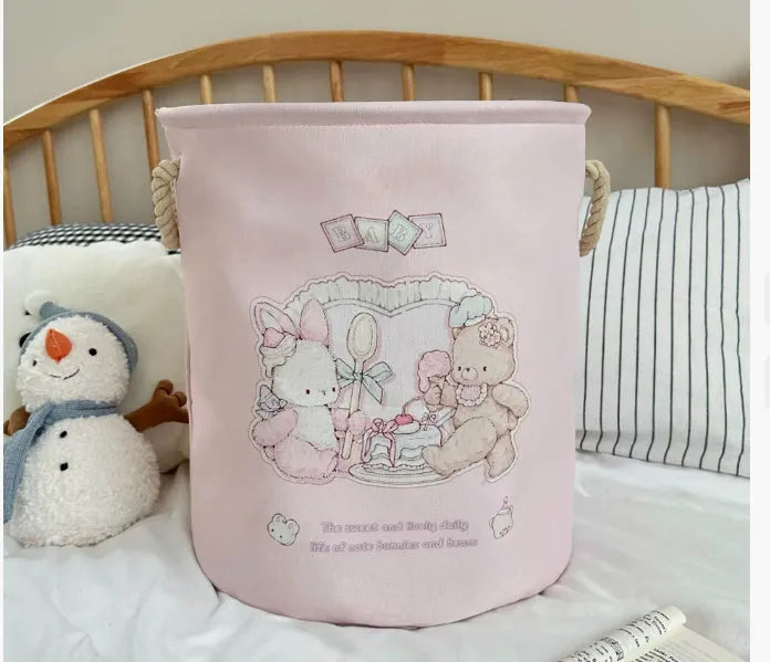 Foldable cotton cloth laundry basket in a character print colour, shown unfolded for use.