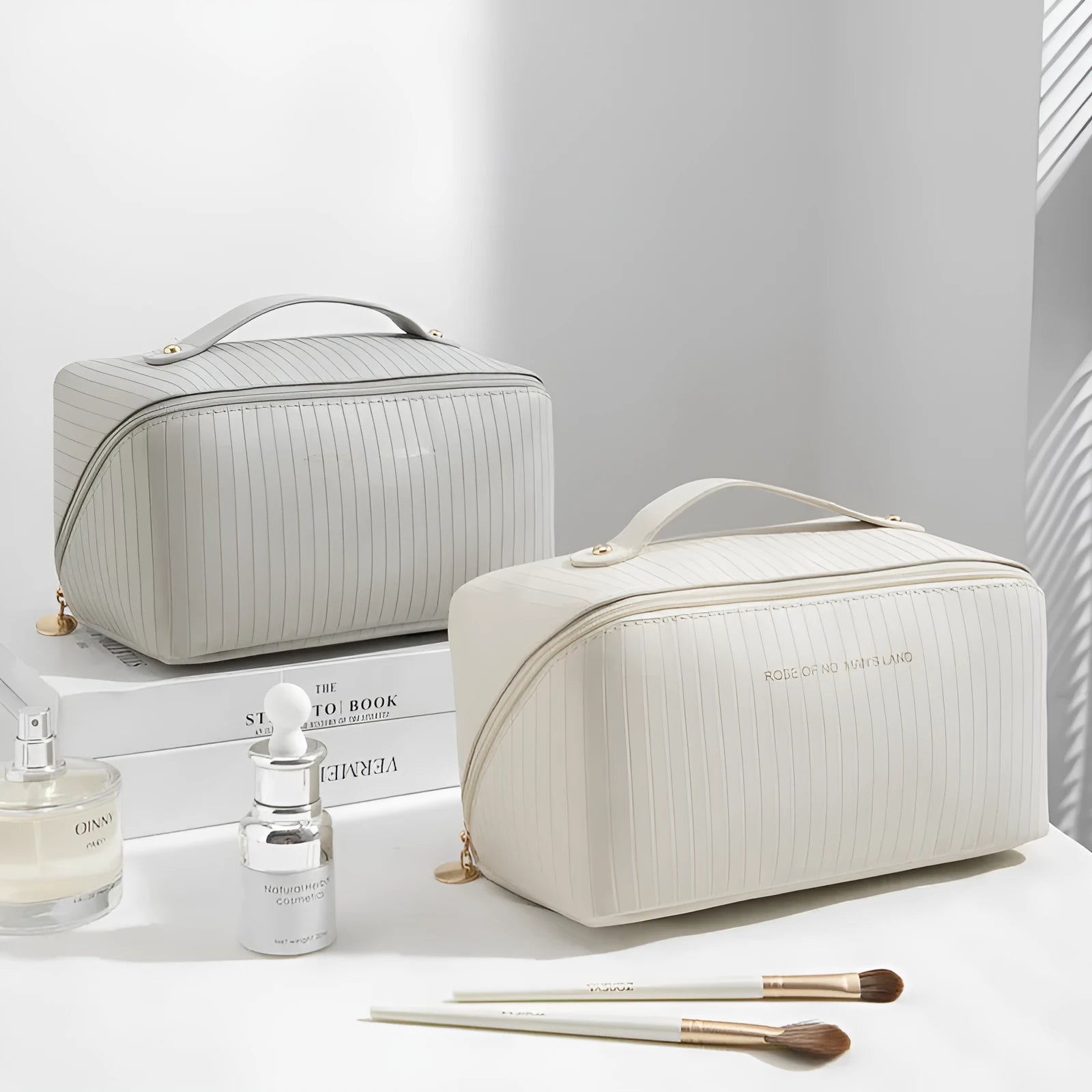 Vertical pattern pillow makeup bag in cubic shape with PU material, shown in available colours.