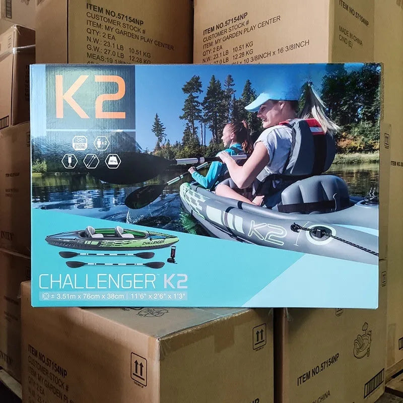 Inflatable two person kayak with PVC hull, double seat, air pump and paddle, 180kg capacity