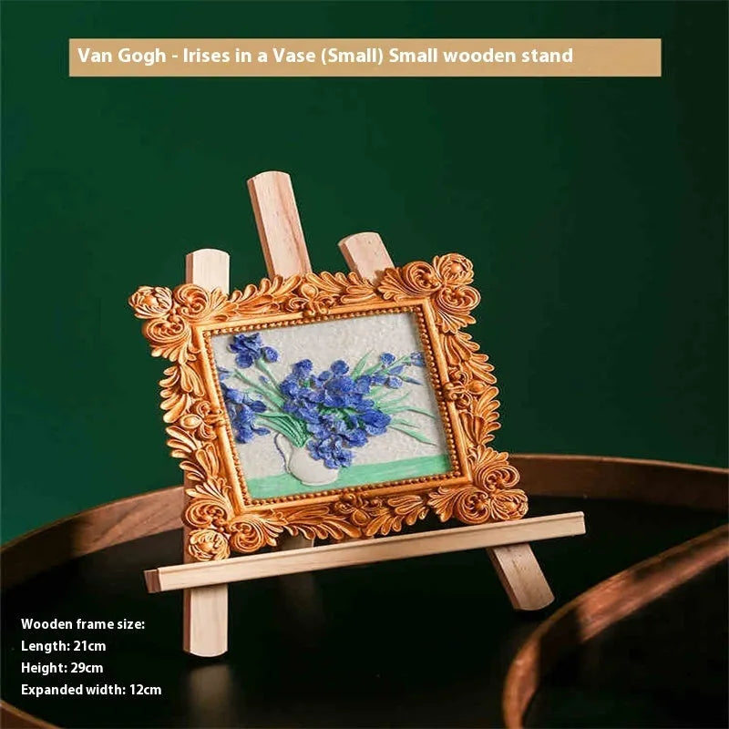 DIY oil painting kit with colour pots, brushes, and a canvas showing Van Gogh's Starry Night design.