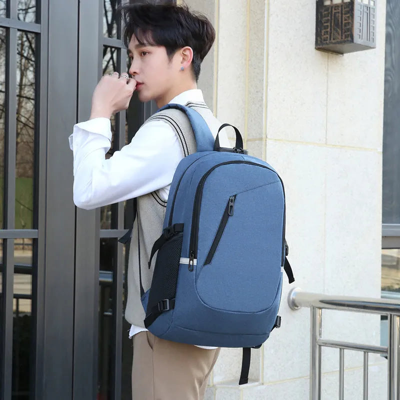 Oxford cloth computer backpack in blue, shown with street style design and laptop compartment.