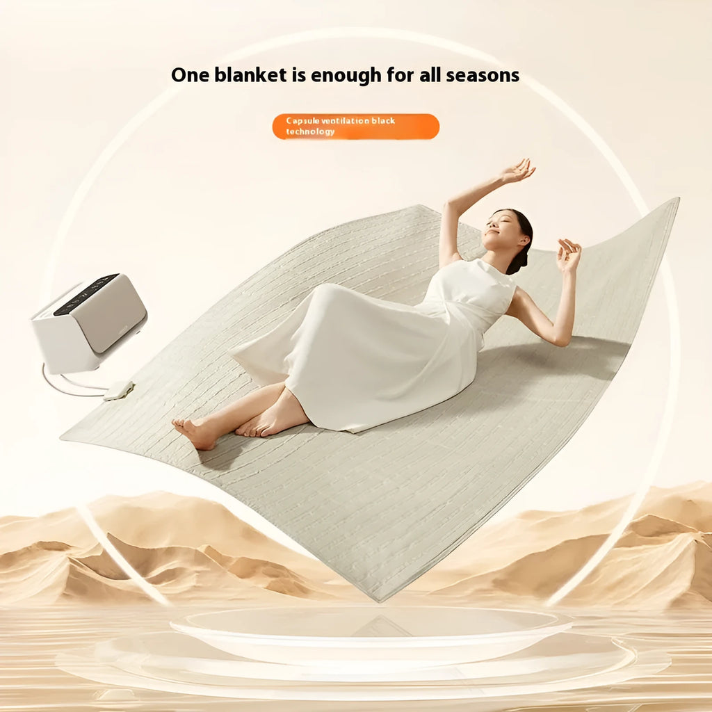 Aideng white electric water blanket with plush surface and smart host unit on a bed.