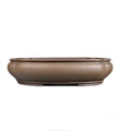 Handmade antique papaya-shaped purple clay flower pot for large plants.