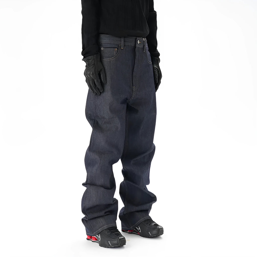Man's dark blue loose straight-leg casual jeans on a white background.