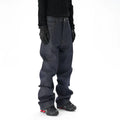Man's dark blue loose straight-leg casual jeans on a white background.
