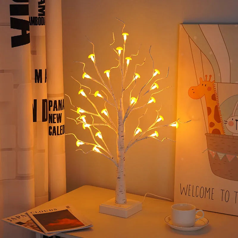 60cm tall white plastic birch tree lamp with small mushroom flowers and warm white LED light.