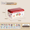 Cartoon-style plastic desktop organiser with grid compartments and red or brown stickers.