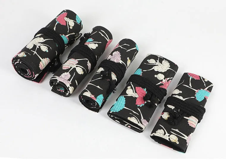 Square canvas rolling pencil case with ballet girl print, showing multiple holes for pencils