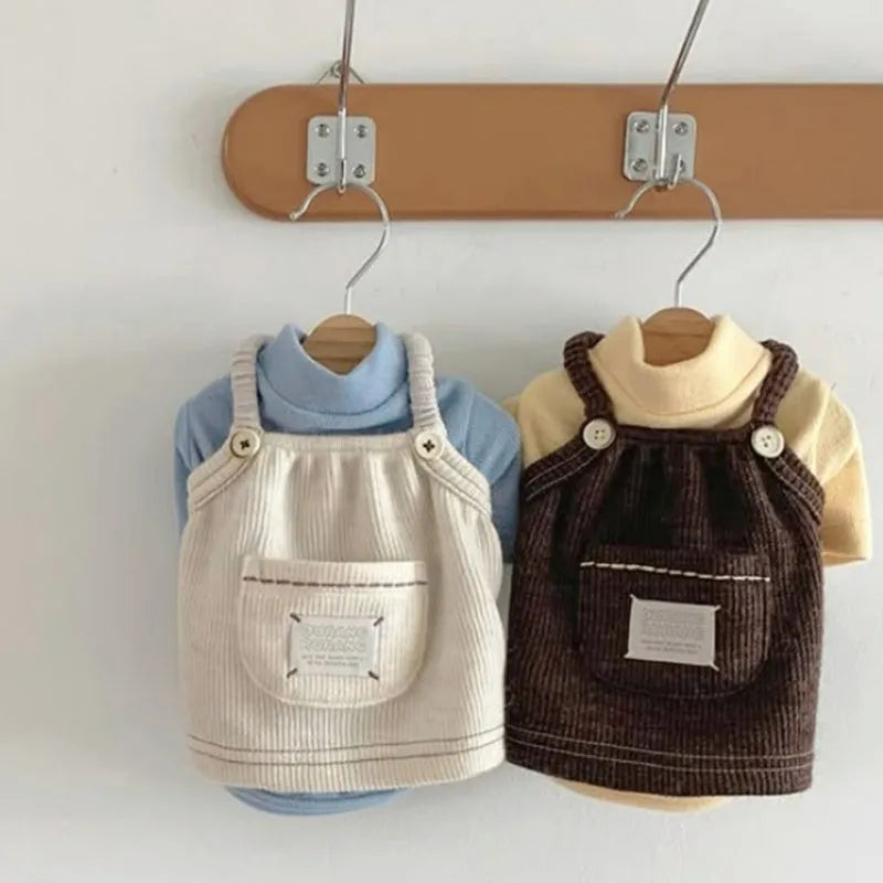 Brown corduroy pet vest with wool Sherpa collar on a small dog, halter design for easy wear