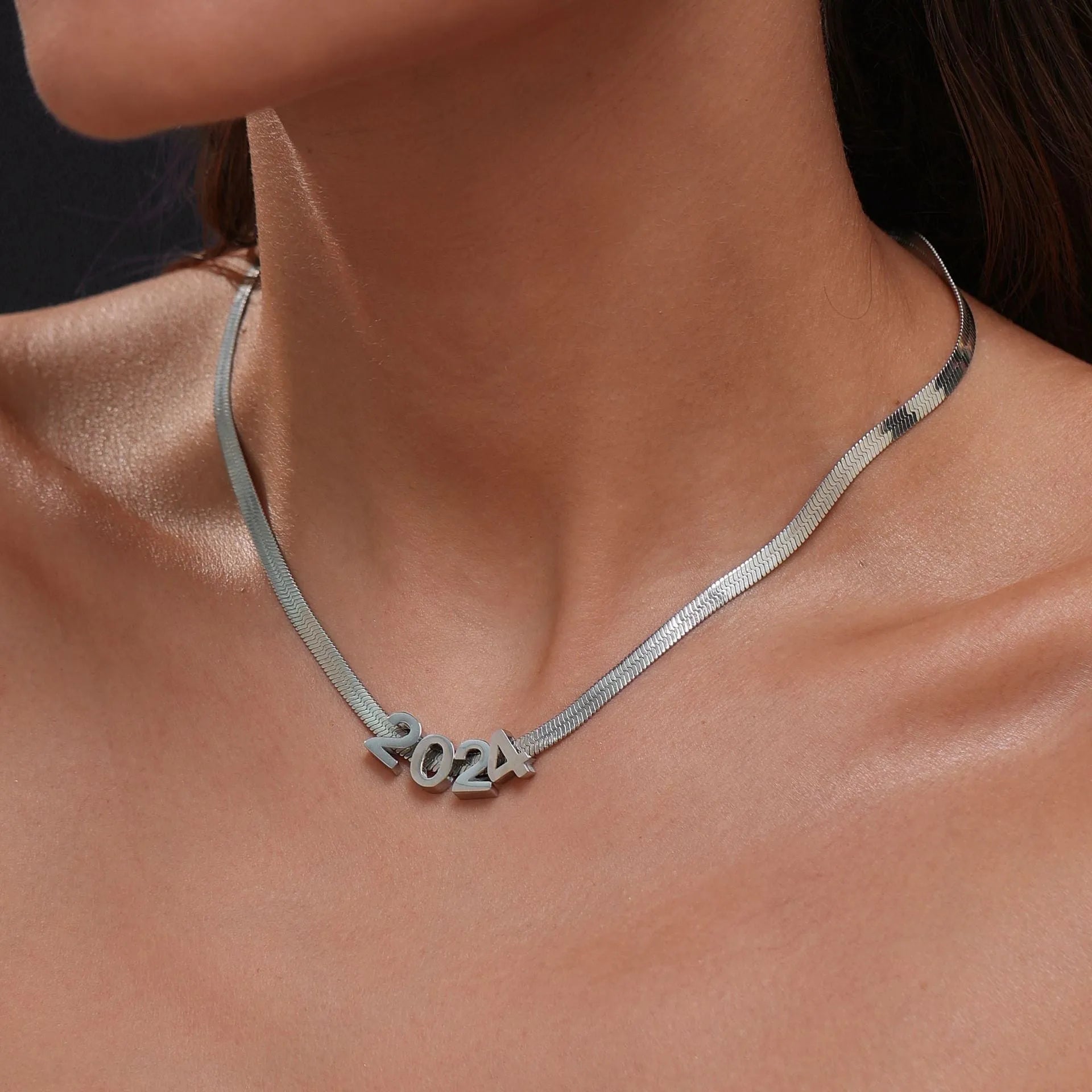 Gold titanium steel necklace with a letter A pendant on a 40.5cm chain.