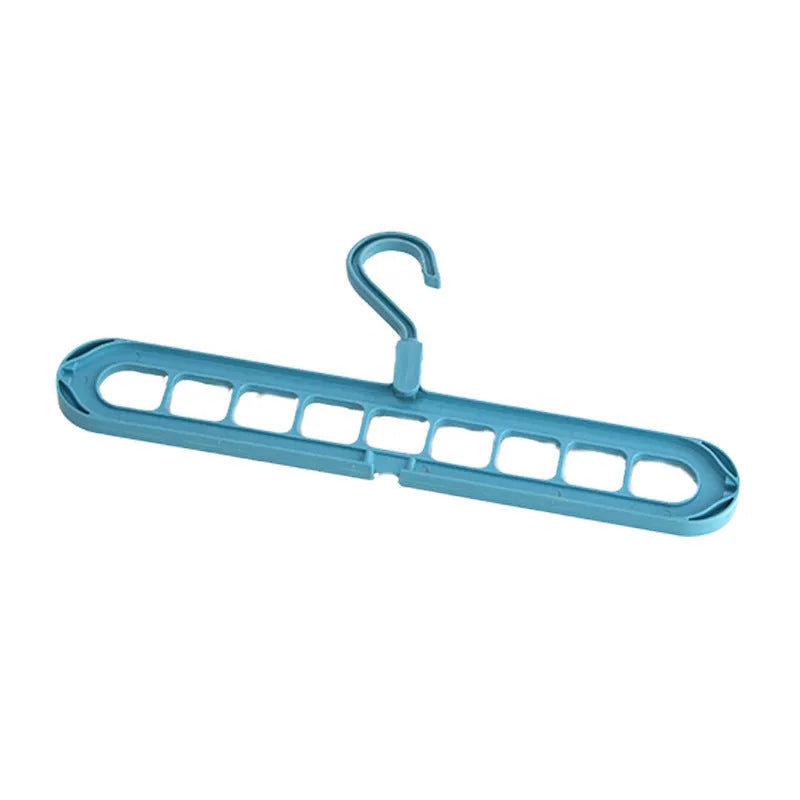 Multifunctional plastic hanger with nine holes for folding trousers, shown in beige