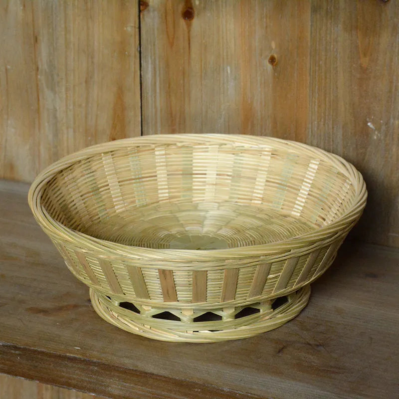 Handmade natural bamboo storage basket showing woven texture in three available sizes