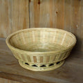 Handmade natural bamboo storage basket showing woven texture in three available sizes