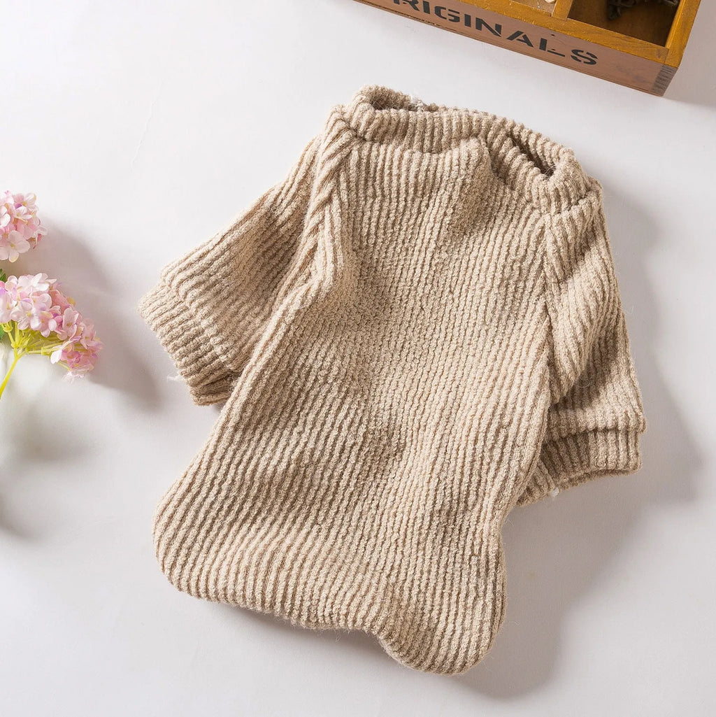 Brown cloth pullover sweater on a small dog, showing casual style and fit.