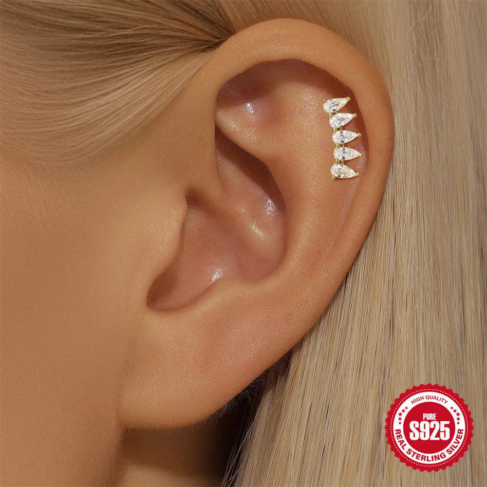 S925 sterling silver geometric moon earring with embedded star design in a gold colour.