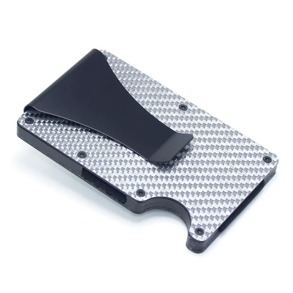 Geometric aluminium and carbon fibre card holder in multiple colours on a table, showing slim 8mm profile.