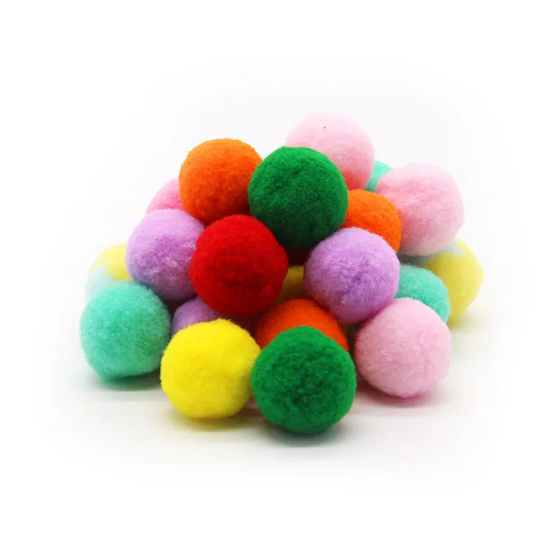 Pet toy set showing foam launch gun and assortment of soft plush balls for interactive fetch games