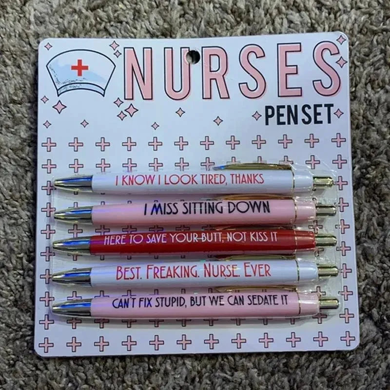 Set of five plastic retractable ballpoint pens with nurse-themed designs on the barrels.