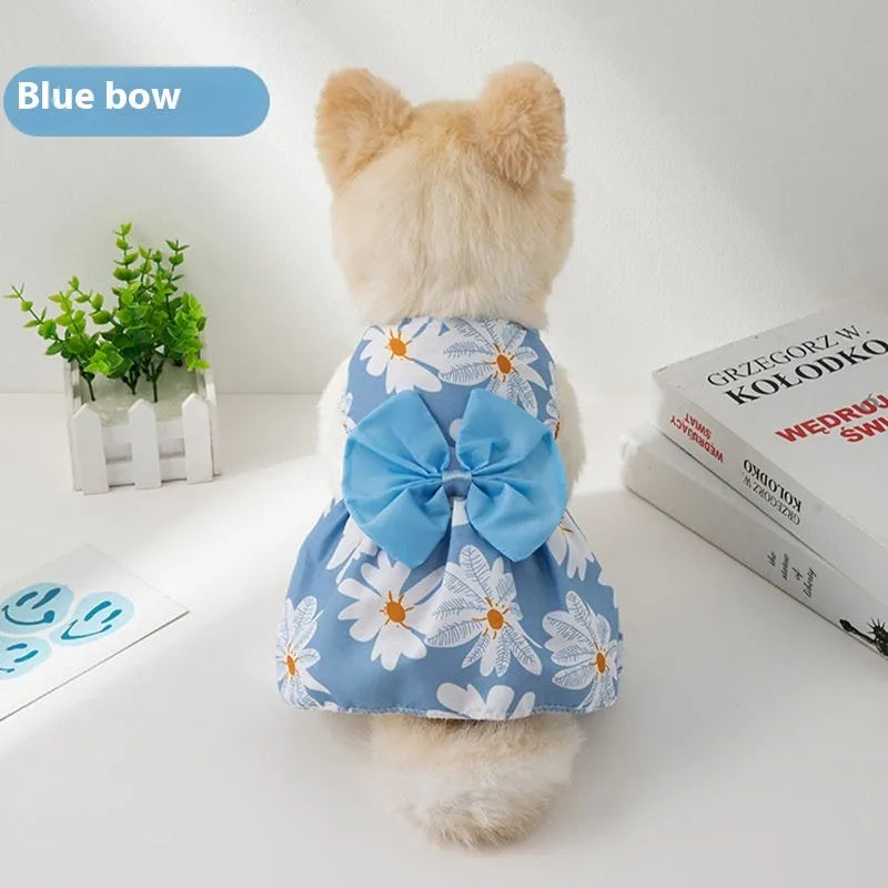 Orange bow floral butterfly pattern polyester dress on a small dog