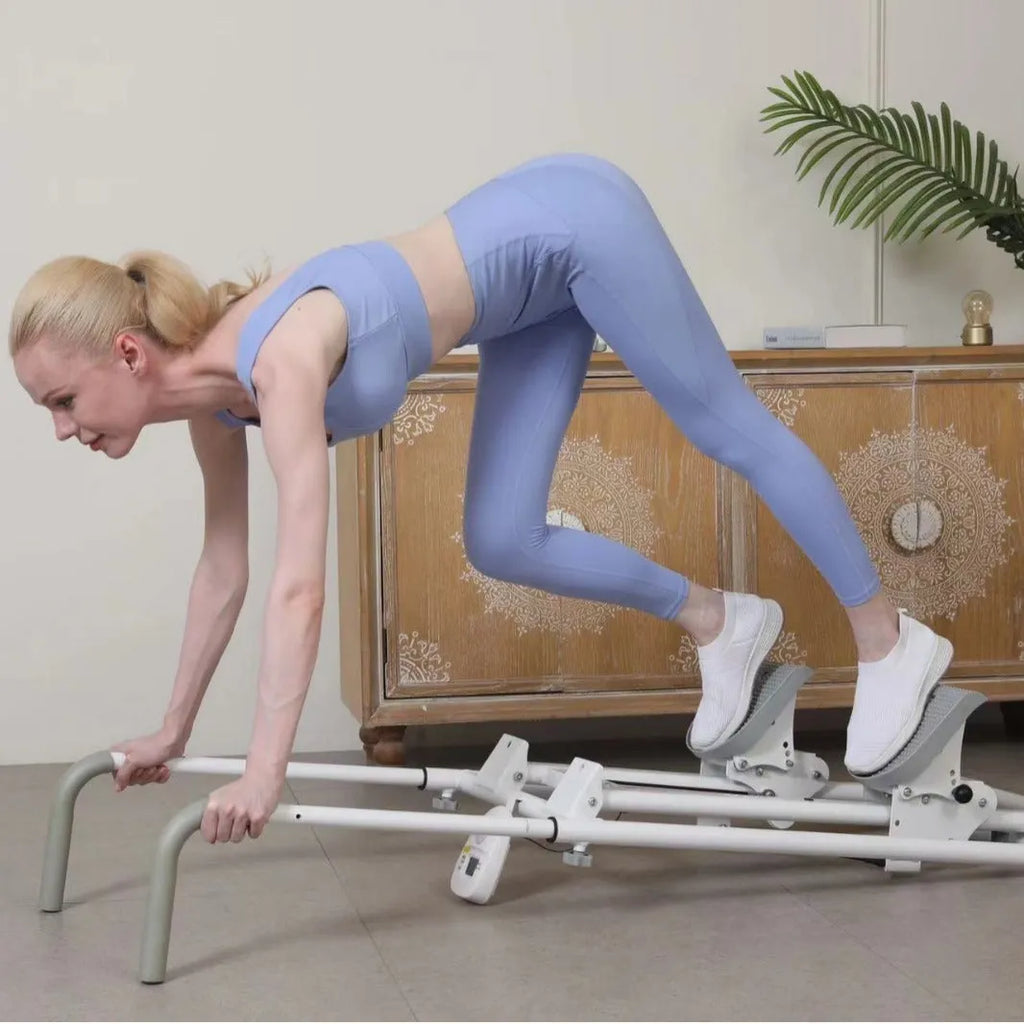 White foldable treadmill with attached indoor climbing frame for home gym use
