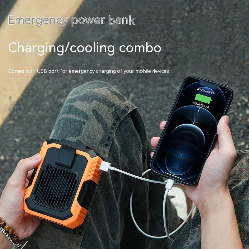 Green wrist hanging personal fan with USB charging port and adjustable strap