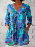 Women's retro-style printed long-sleeved top in a slim fit, shown in a colour option, suitable for smart casual wear.