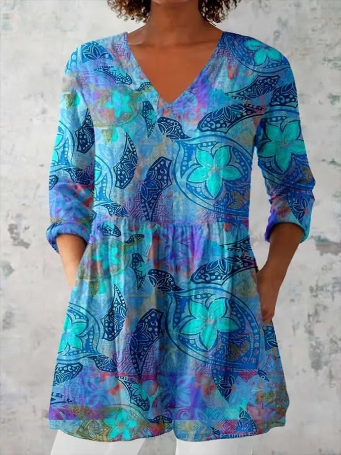 Women's retro-style printed long-sleeved top in a slim fit, shown in a colour option, suitable for smart casual wear.