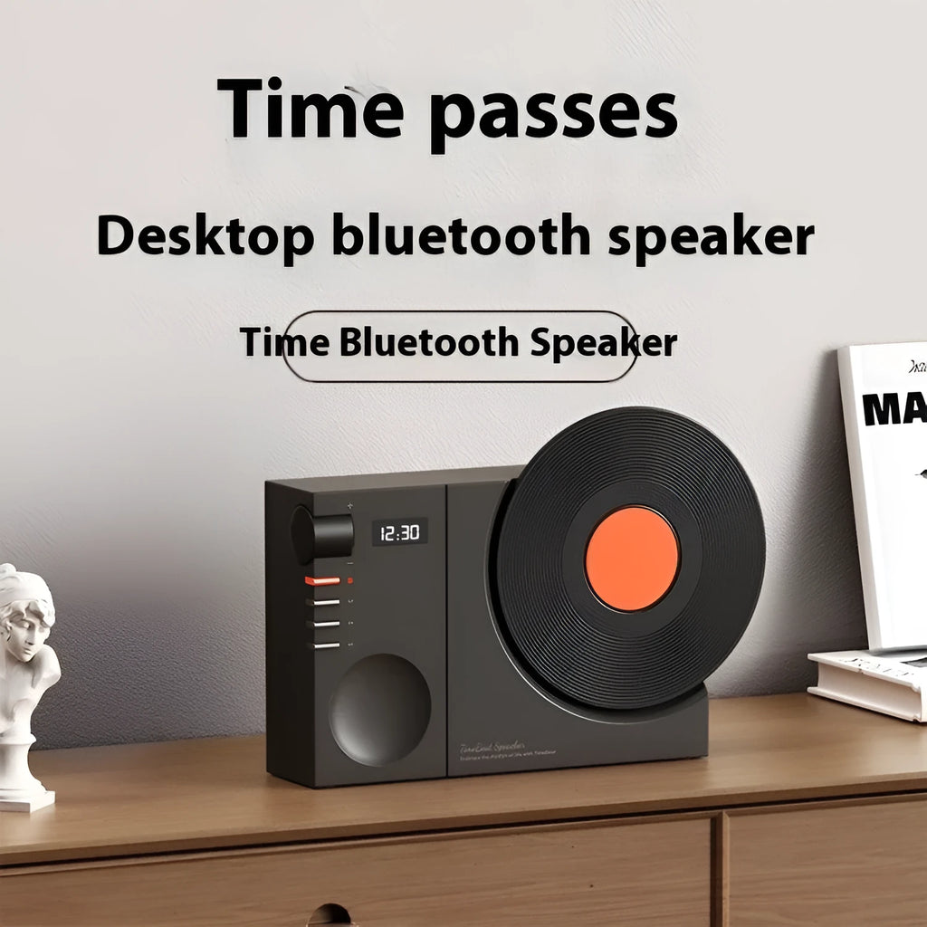 Mini portable Bluetooth speaker in Obsidian Black with USB charging port and card insertion slot.