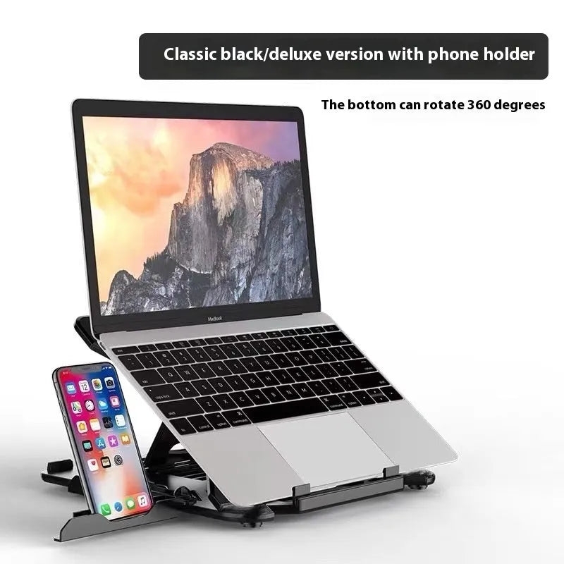 Black ABS plastic laptop cooling bracket with integrated strap phone holder on a desk.