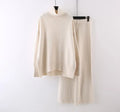 Women's beige acrylic knit sweater and wide-leg trousers two-piece set laid flat.