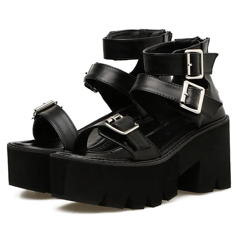 Black women's punk style platform sandals with chunky heel, round toe, buckle straps, and a rear zipper.