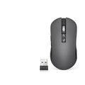 IFLYTEK wireless gaming mouse with voice translation microphone on a desk next to a laptop.