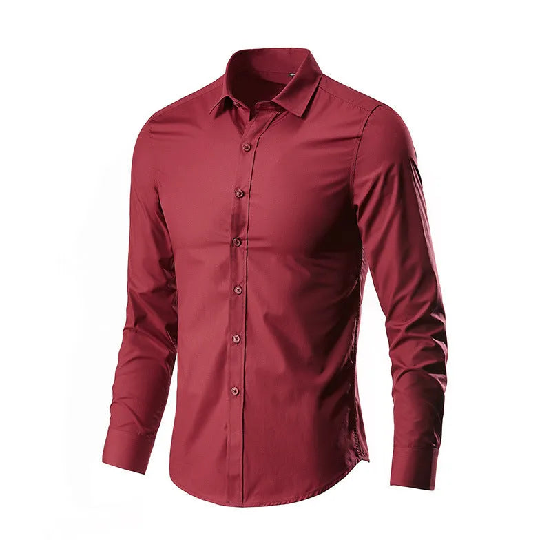 Man wearing a loose slim-fit linen long-sleeve shirt in a neutral colour.